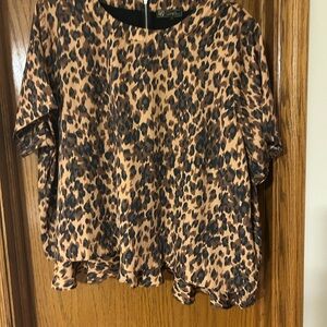 DG2 Diane Gilman Leopard Print Blouse with layered trim and gold zipper.